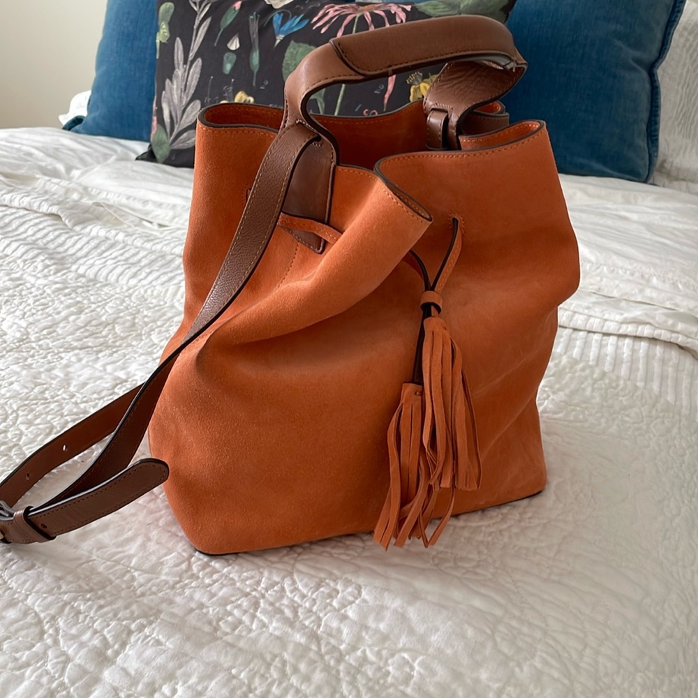 Burnt orange with brown straps bucket bag by Gerard Darel
